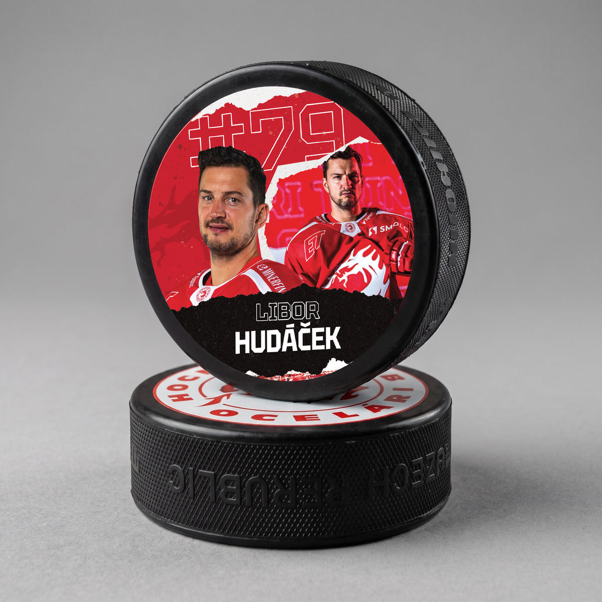 Puk s hráčem 26/27 HC Oceláři
